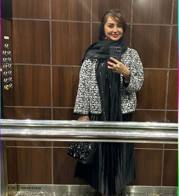 خانم نفیسه روشن از این آسانسور هیچجوره دِل نمیکند